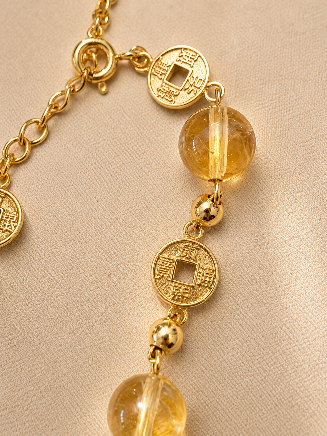 Citrine bead bracelet with antique coin charms and enamel tag. Gold-plated S925 silver, 16cm with extender.