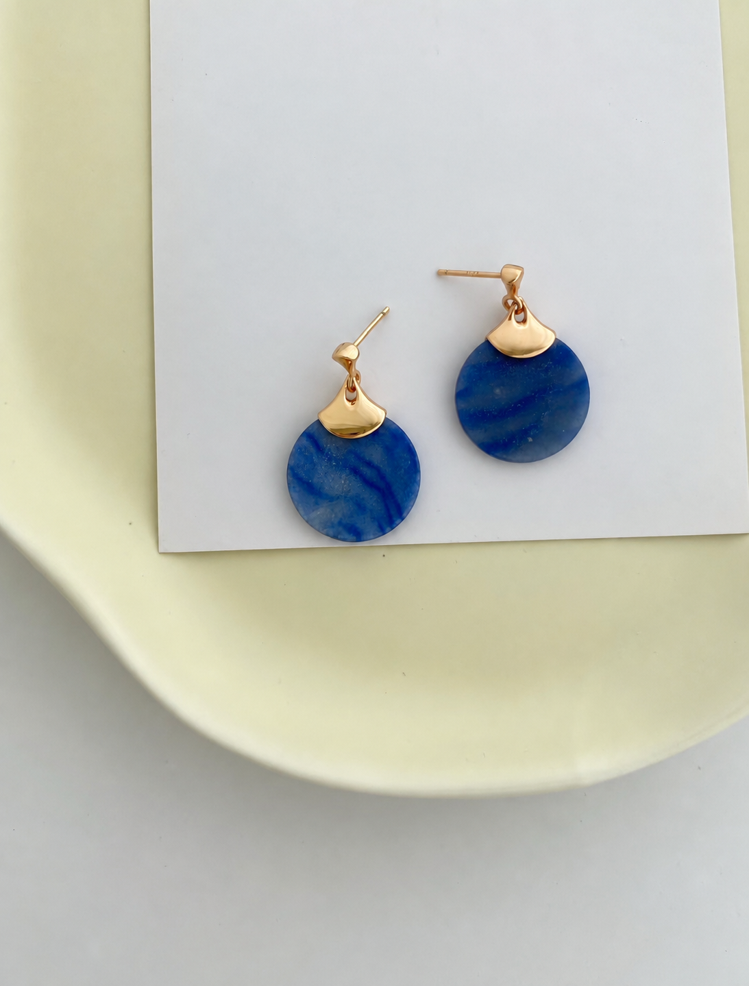 Natural blue aventurine disc earrings with a gold fan accent, on gold-plated S925 silver. Secure post closure.