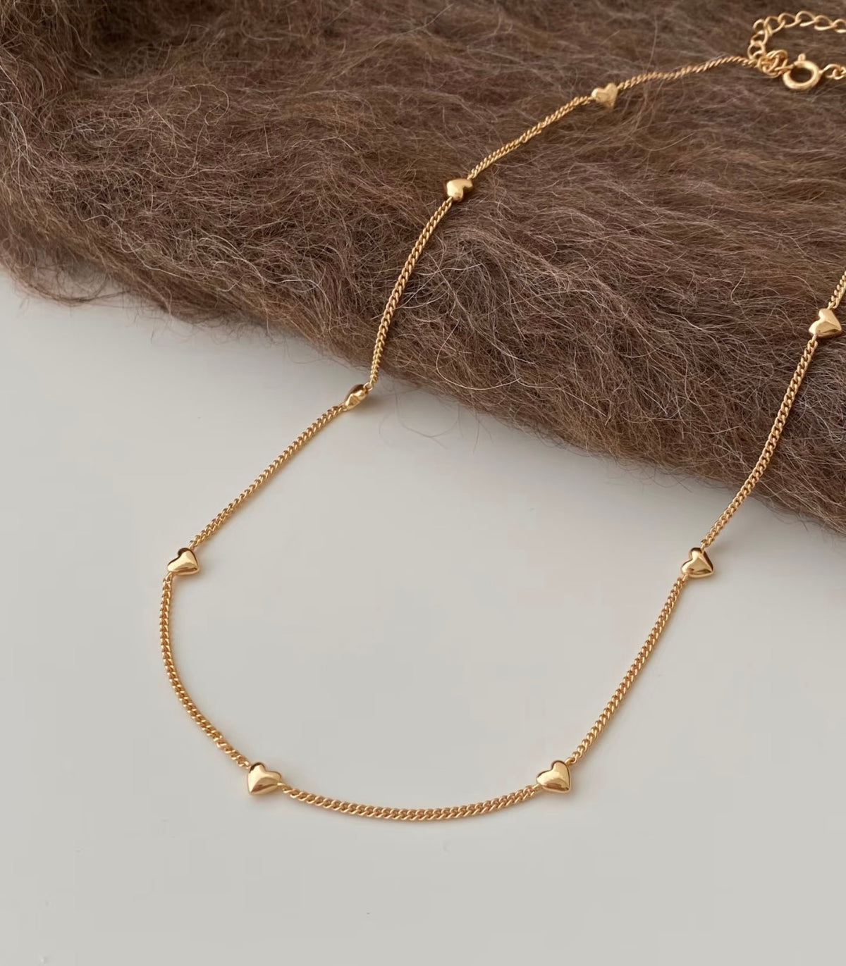 Double-strand heart station necklace in S925 silver, 18K rose gold or white gold plated. 38cm with extender.