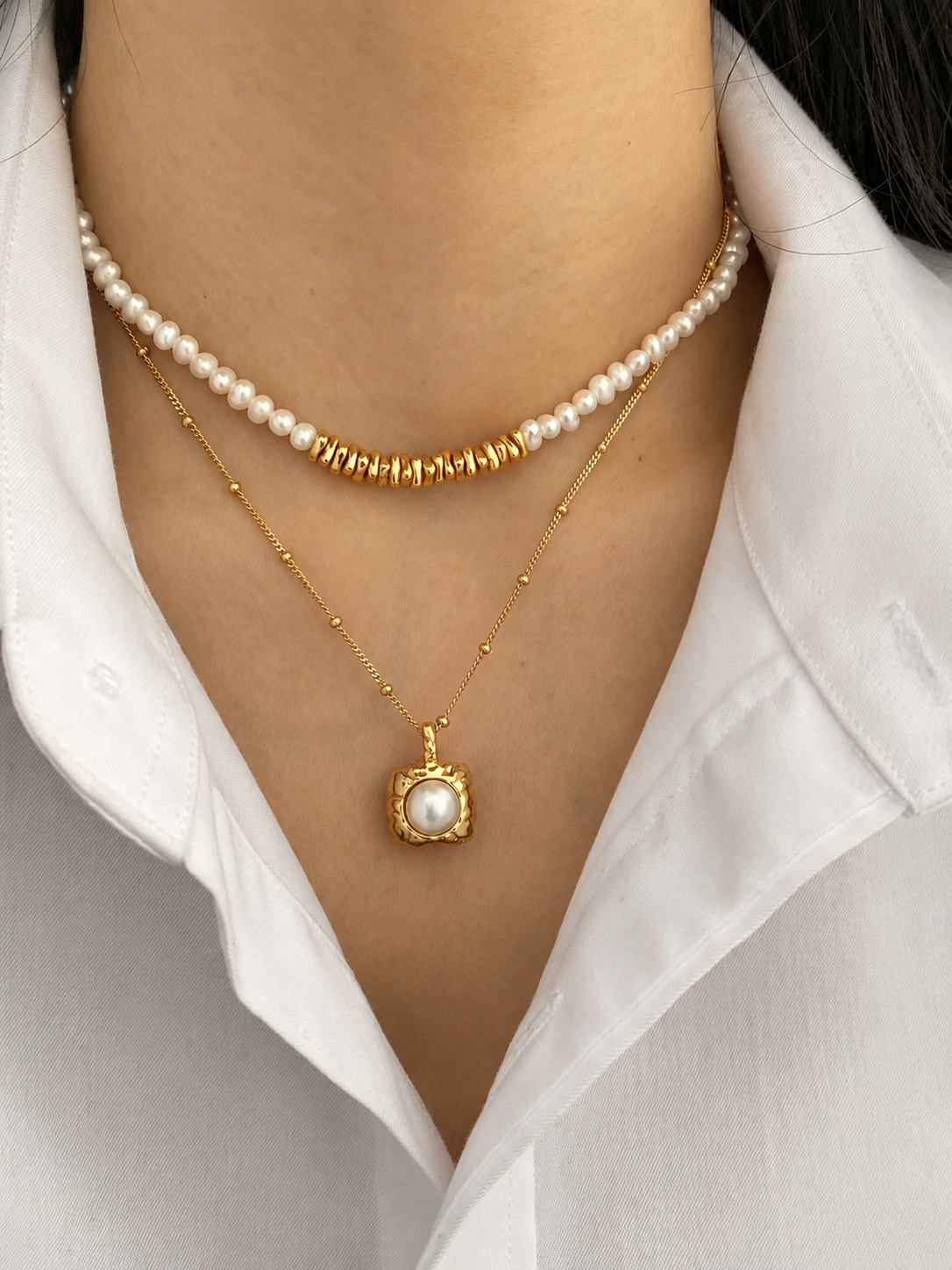 Hammered gold tag pendant with a freshwater pearl, on a beaded S925 silver chain. 40cm with extender.