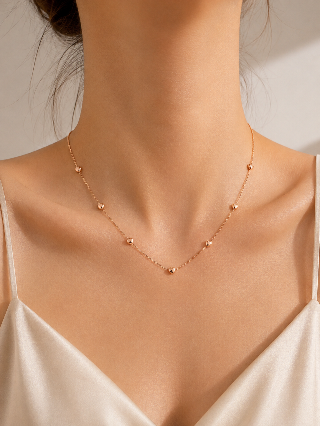 Double-strand heart station necklace in S925 silver, 18K rose gold or white gold plated. 38cm with extender.
