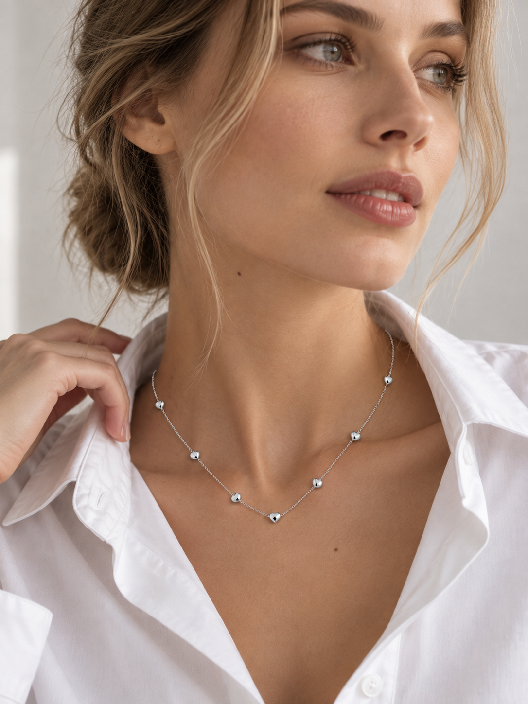Double-strand heart station necklace in S925 silver, 18K rose gold or white gold plated. 38cm with extender.