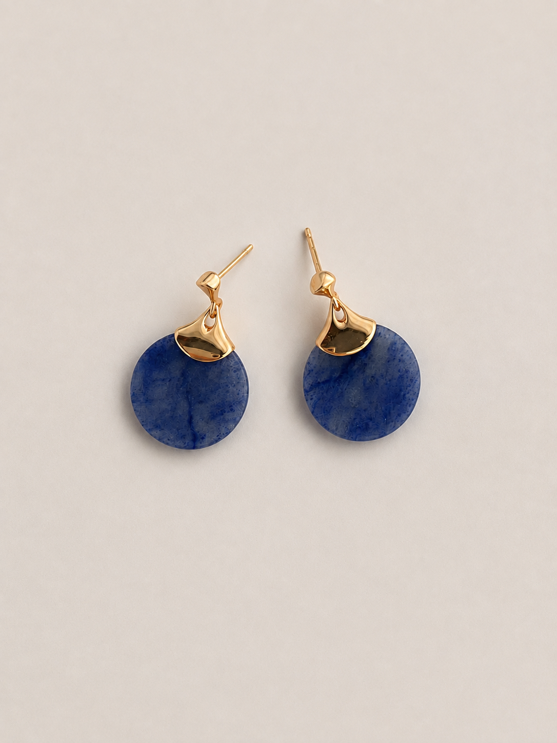 Natural blue aventurine disc earrings with a gold fan accent, on gold-plated S925 silver. Secure post closure.